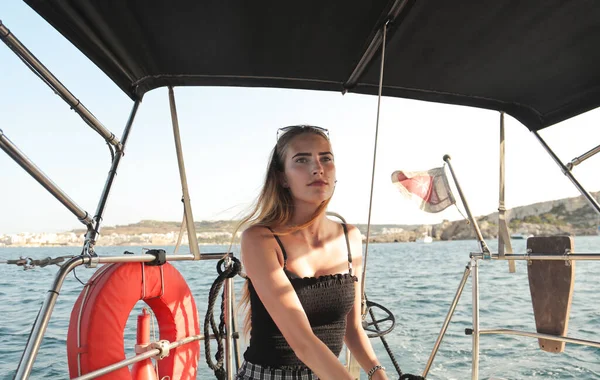 portrait of young woman on a boat