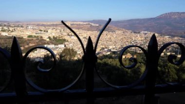 View of the old town of Fez (Fes), Fes el Bali and Fes el Jdid, Morocco. Famous touristic travel destination and UNESCO World Heritage site. 4k, establishing shot.