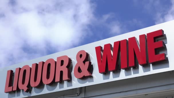 Sign Liquor Wine Store Bright Blue Sky Stock Video