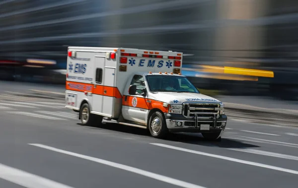 Ambulance Racing Downtown City Street Motion Blur — Stock Photo, Image