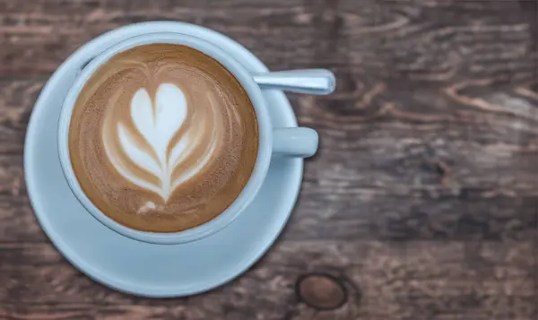 Kopp Kaffe Komplett Med Latte Konst Skummande Mjölk Ett Rustikt Stockbild