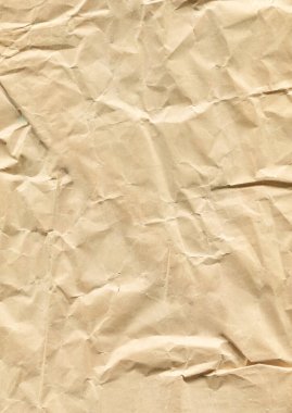 Buruşuk desenli, kırsal arka planlı kahverengi el işi kağıt.