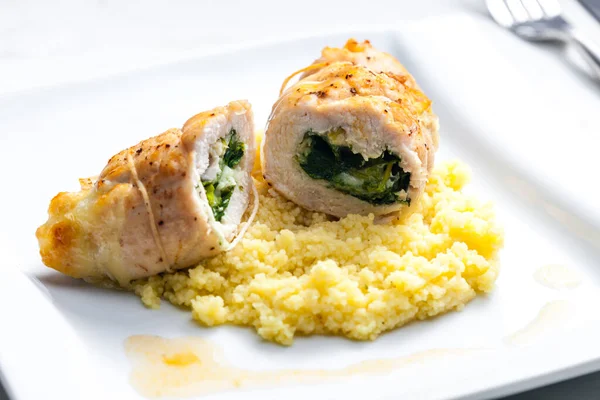 Poultry Roulade Filled Spinach Cheese Served Couscous — Stok fotoğraf
