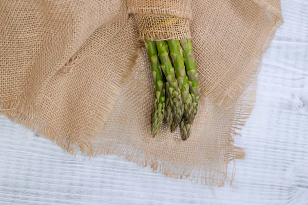 stock image still life with fresh green asparagus