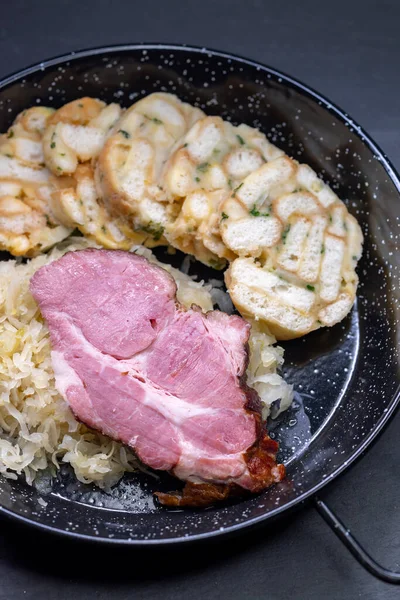 stock image smoked meat served with sauerkraut and dumplings