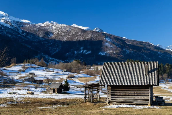 Typical landscape with wooden log cabins near Bohinjska Bistrica, Triglavski national park, Slovenia