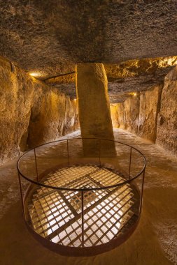 Interior of the Menga dolmen, view of the central pillar, UNESCO site, Antequera, Spain