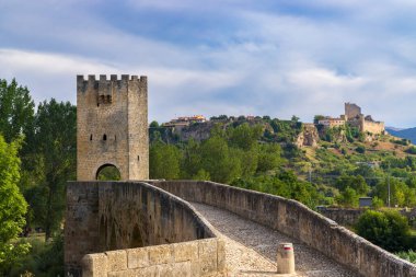stone bridge over Ebro river in Frias, Burgos province, Castilla Leon, Spain