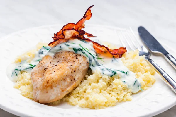 Poultry Breast Spinach Creamy Sauce Bacon Served Couscous — Stok fotoğraf