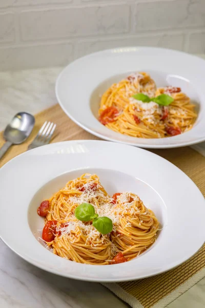 Spaghetti Tomatoes Basil Parmesan Cheese — Stock Photo, Image