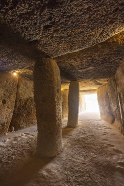 Interior of the Menga dolmen, view of the central pillar, UNESCO site, Antequera, Spain