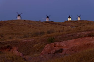 Windmills near Alcazar de San Juan, Toledo, Castilla La Mancha, Spain clipart