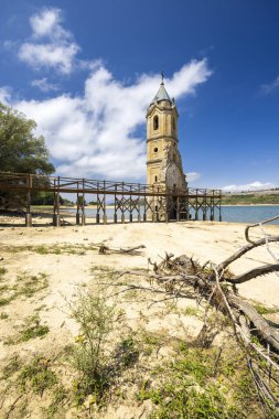 swamped church of San Roque near Villanueva de las Rozas, Cantabria, Spain clipart