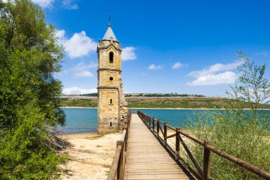 swamped church of San Roque near Villanueva de las Rozas, Cantabria, Spain clipart