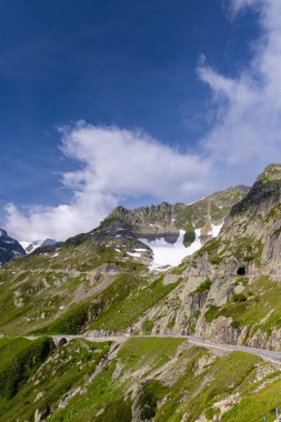 Landscape near Sustenpass with high alpine road, Innertkirchen - Gadmen, Switzerland clipart