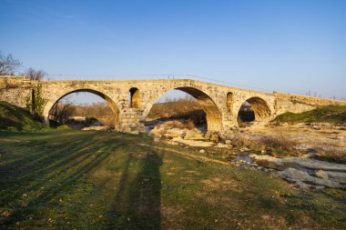 Pont Julien, roman stone arch bridge over Calavon river, Provence, France