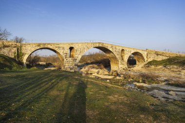 Pont Julien, roman stone arch bridge over Calavon river, Provence, France