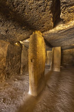 Interior of the Menga dolmen, view of the central pillar, UNESCO site, Antequera, Spain