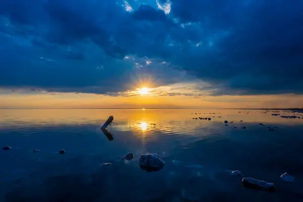Breathtaking View Sunset Calm Lake Featuring Striking Cloud Formations Reflective 스톡 사진