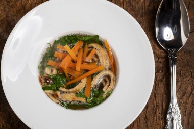 austrian pancake soup on wood