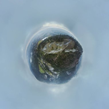 panoramic bird's eye view of rocky winter mountains