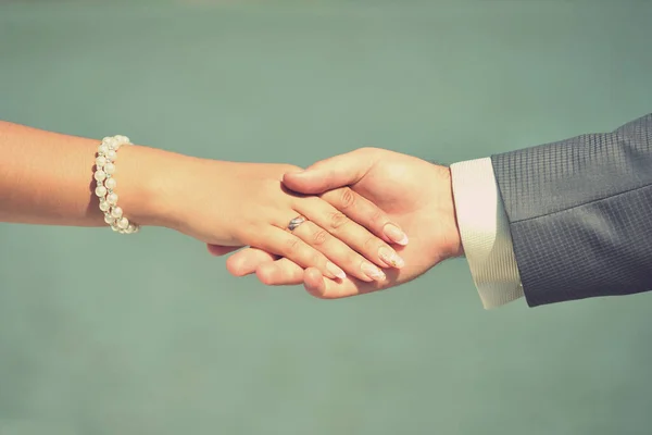 stock image business people shaking hands, finishing up a meeting, in a 