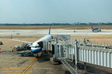 Ho Chi Minh / Vietnam - 30 Mart 2019: Çin Güney Havayolları bir sonraki uçuş için Ho Chi Minh Havalimanı 'na iniyor ve başka bir uçuşa hazırlanıyor