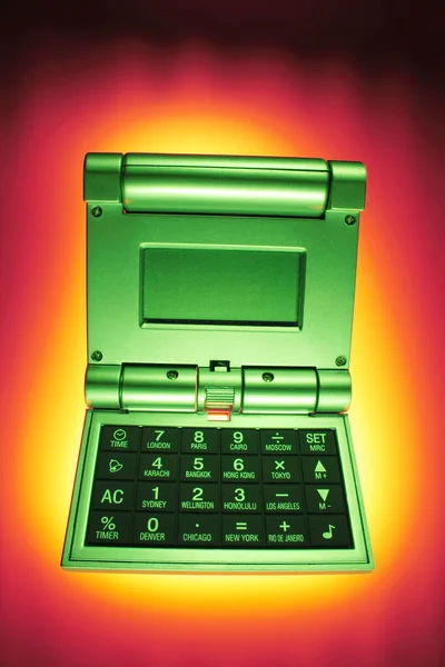 Kalkulator Zegar Ciepłym Tle — Zdjęcie stockowe