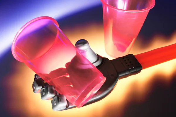 Robotic Hand Plastic Beaker — Stock Photo, Image