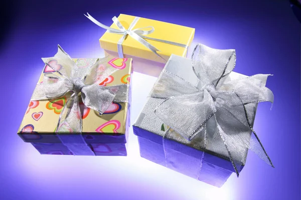 Gift Parcels Purple Background — Stock Photo, Image