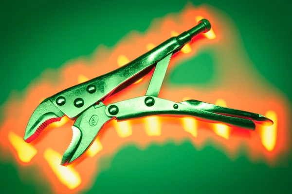 Gripping Plier Green Background — Stock Photo, Image