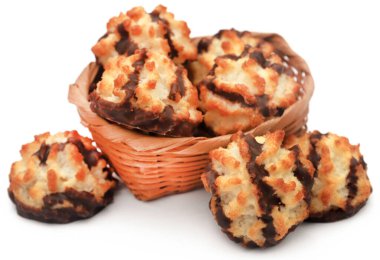 Tasty coconut chocolate cookies over white background