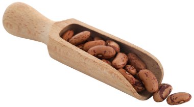 Tahta bir kepçenin içindeki benekli fasulye mi?