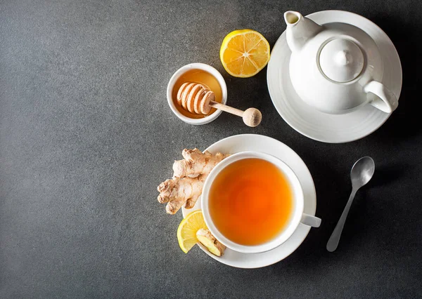 Cup Hot Ginger Tea Fresh Ginger Root Lemon Grey Background Stock Picture
