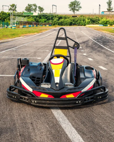 go kart on a racing asphalt track in the open air on a clear sunny day close up