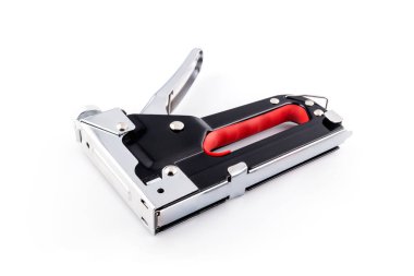 İnşaat zımbası beyaz arka planda, yakın planda izole edilmiş.