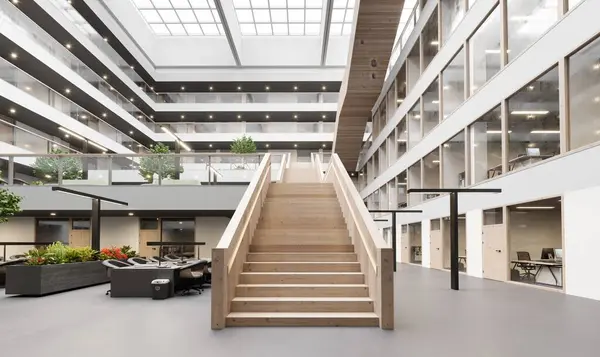 带有楼梯的现代化办公大楼内部的3D渲染 图库照片