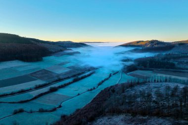 the landscape of the siegerland in germany in winter from above clipart
