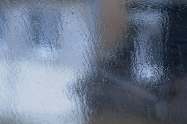 Raindrops on the window. Abstract background for design. Texture.