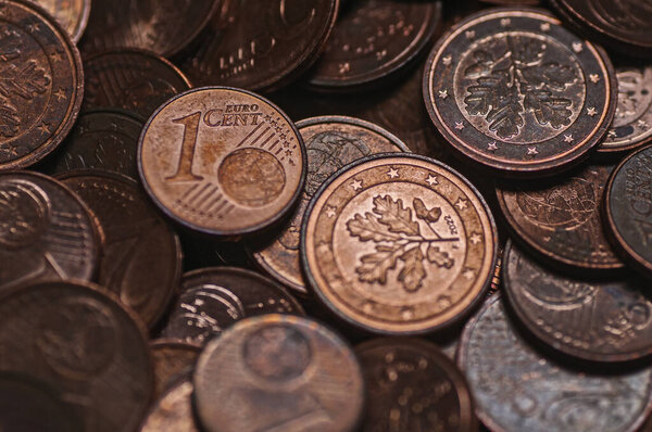 Pile of old coins. Close up. Selective focus.