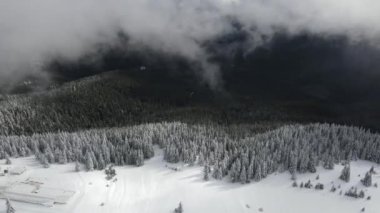 Amazing Aerial winter view of Rila mountain near Belmeken Dam, Bulgaria