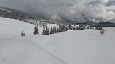 Amazing Aerial winter view of Rila mountain near Belmeken Dam, Bulgaria