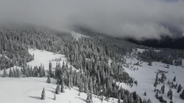 Amazing Aerial winter view of Rila mountain near Belmeken Dam, Bulgaria