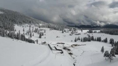 Amazing Aerial winter view of Rila mountain near Belmeken Dam, Bulgaria