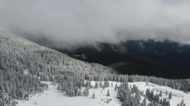 Amazing Aerial winter view of Rila mountain near Belmeken Dam, Bulgaria