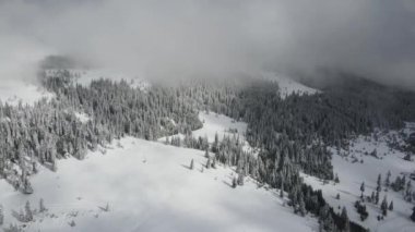 Amazing Aerial winter view of Rila mountain near Belmeken Dam, Bulgaria