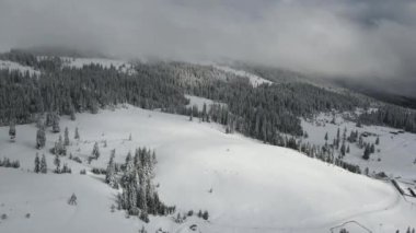 Amazing Aerial winter view of Rila mountain near Belmeken Dam, Bulgaria