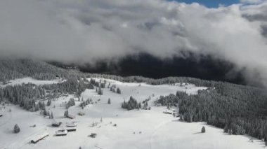 Amazing Aerial winter view of Rila mountain near Belmeken Dam, Bulgaria