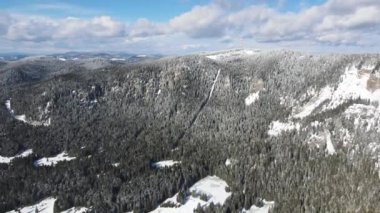 Aerial winter view of Rhodope Mountains around resort of Pamporovo, Smolyan Region, Bulgaria