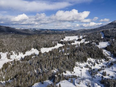 Aerial winter view of Rhodope Mountains around resort of Pamporovo, Smolyan Region, Bulgaria